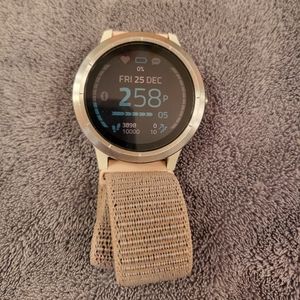 Silver Garmin Vivoactive 4 with multiple colored rubber covers and watch band